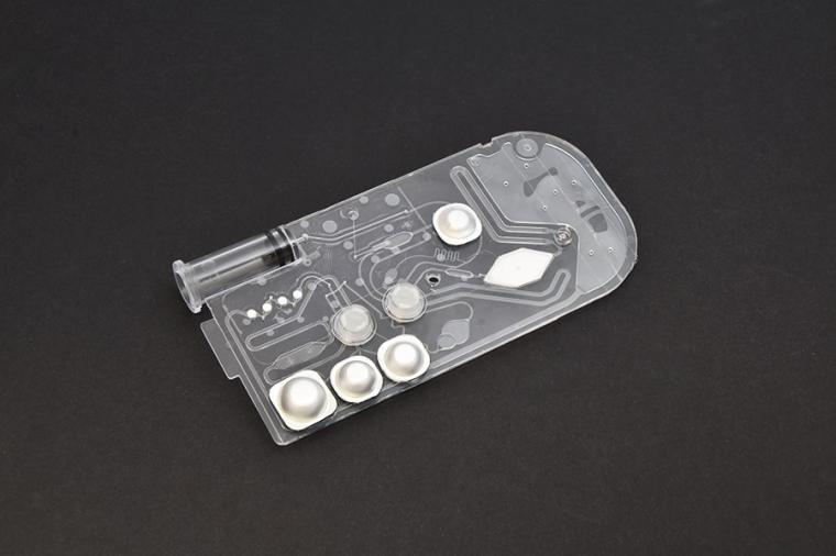 Microfluidic cartridge for immunoassays.