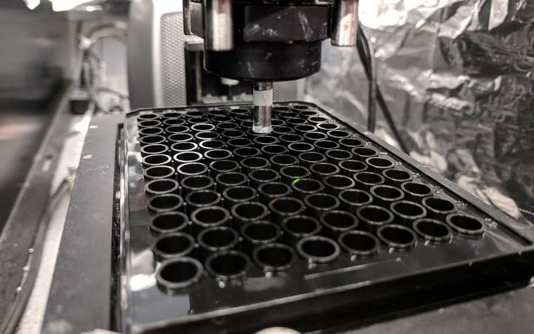 The high-throughput 3D bioprinting setup performing prints on a standard...