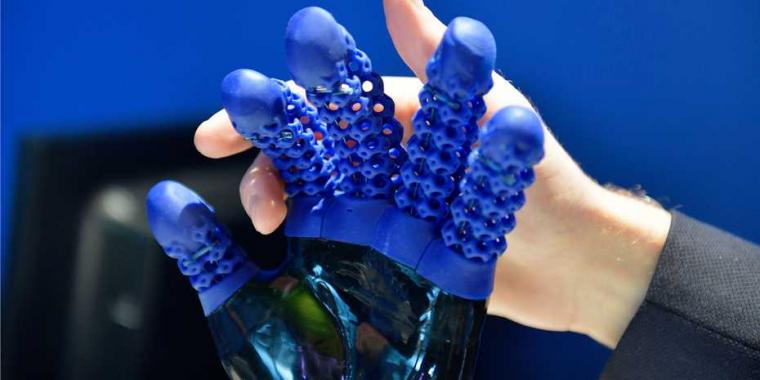 The glove of the soft robot hand are made using Spectroplasts silicone printing...