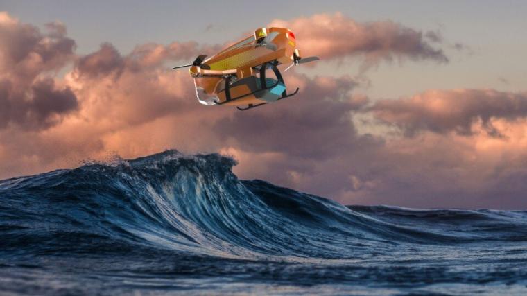 The drone flies above water.
