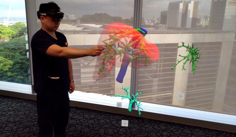 With the help of a Mixed Reality headset, a 3D hologram of a patient’s liver...