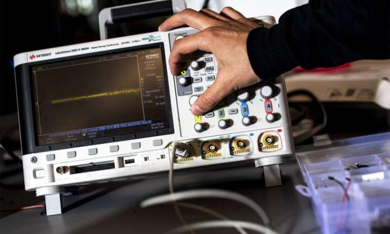 Student Raffaele Guidainfini uses an oscilloscopes to conduct research for...
