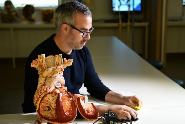 Chief investigator Dr Albert Ruiz-Vargas with the 1mm heart probe prototype...