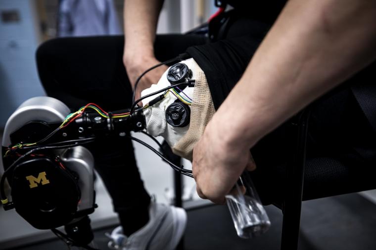Dawn Jordan Musil tests an open-source robotic leg designed by Elliott Rouse,...