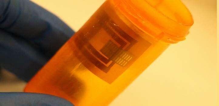 A flexible computer inside a medication bottle can send wireless SMS messages...