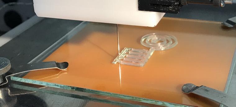 Using a 3D printer, the nanocellulose ink is applied to a carrier plate. Silver...