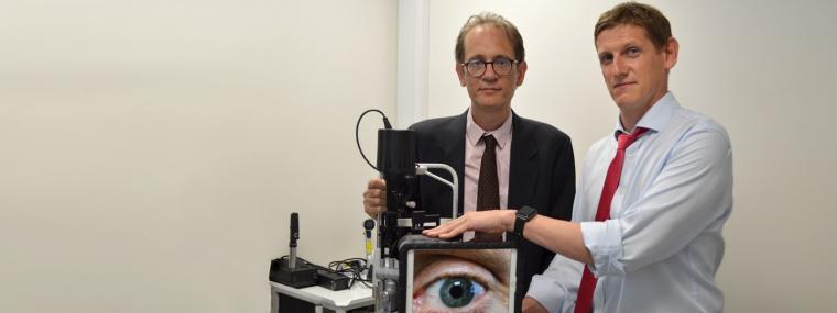 Dr Mario Giardini & Dr Iain Livingstone with a slit lamp used in virtual...