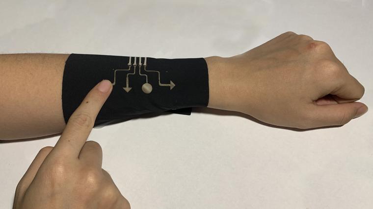 A prototype demonstrated textile-integrated touch sensing for human-machine...
